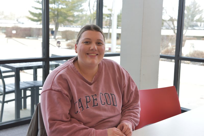 Student smiling in the Sudent Center Dining Commons.